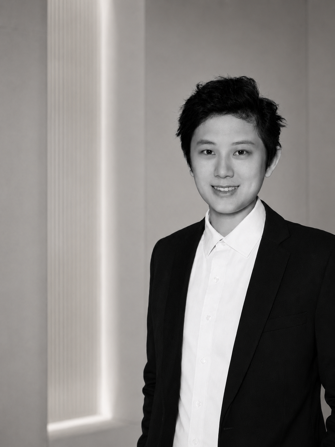 Lisa Zhu in a modern architectural interior