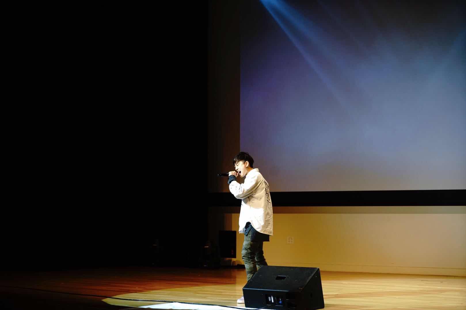 Lisa Zhu performing on stage